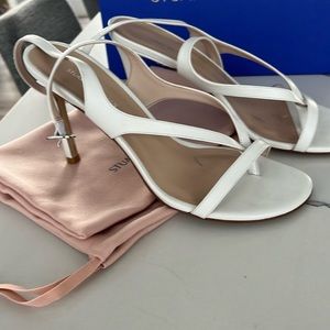 Stuart Weitzman white leather steppe Align sandal.